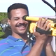 Man holding a video camera in the 1991 promotional video “A Day at Epcot Center”